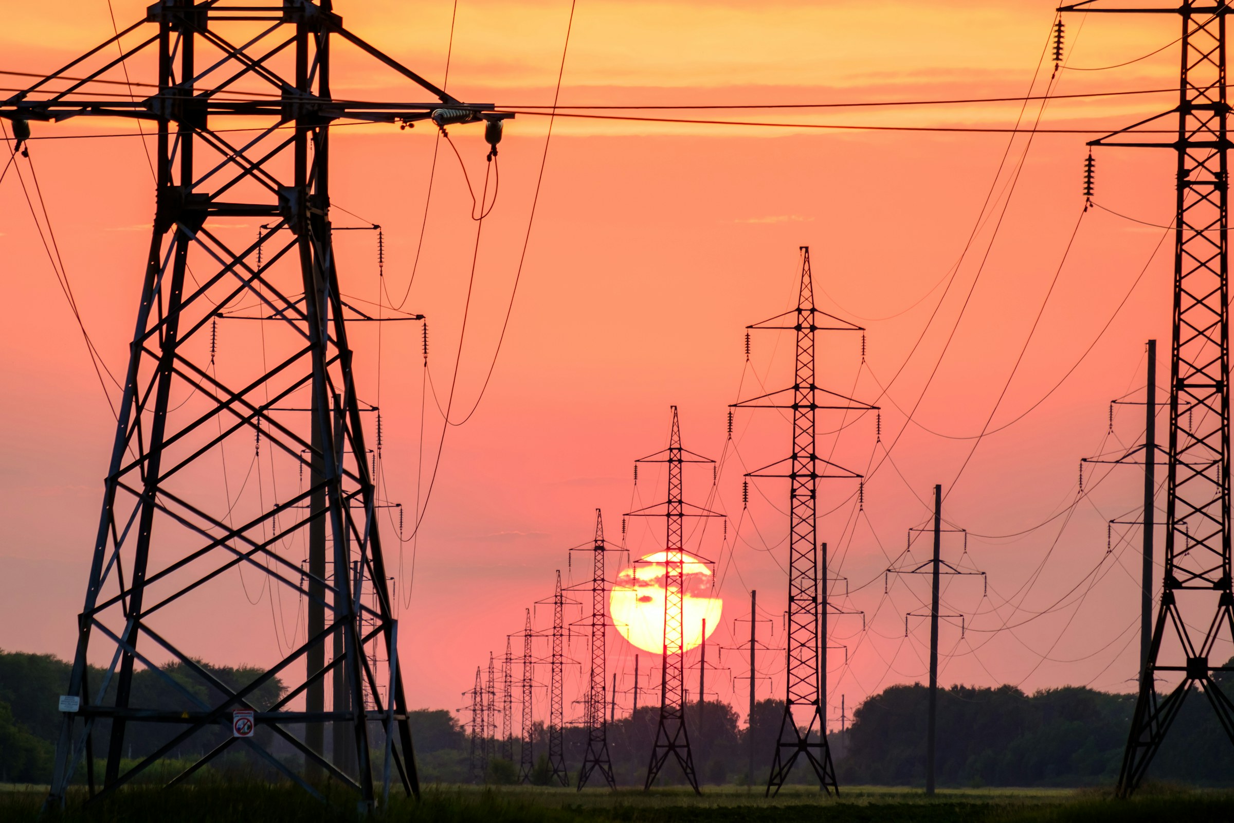 Electricity transmission infrastructure at sunset